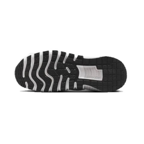 Vista inferior de la suela de la Nike Metcon Free con patrón multidireccional en color negro y blanco, diseñada para tracción y estabilidad en entrenamientos funcionales.